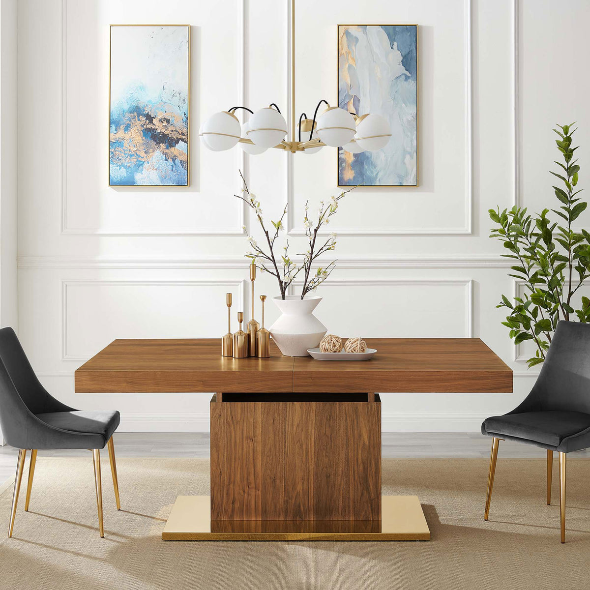 Vector dining table in a contemporary dining room paired with upholstered chairs and decor || EEI-4660-WAL-GLD || front_room