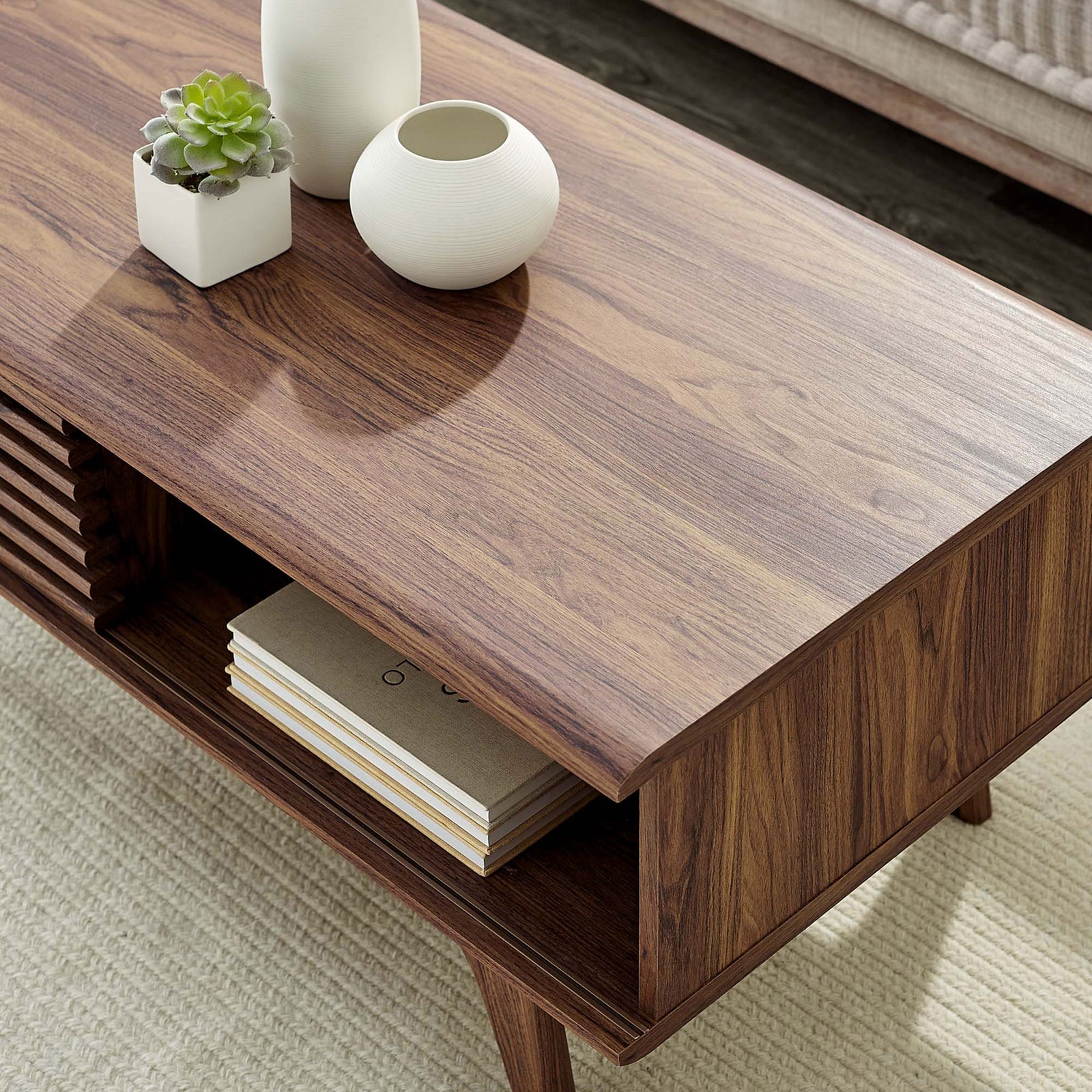 Smooth wood grain tabletop with open cubby for books and decor || EEI-4724-WAL || detail_room