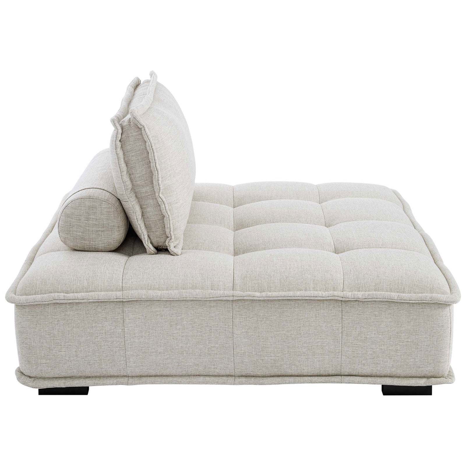 Low-profile, deep seat silhouette with a tufted cushion and supportive backrest with matching bolster. || EEI-4725-BEI || side_studio
