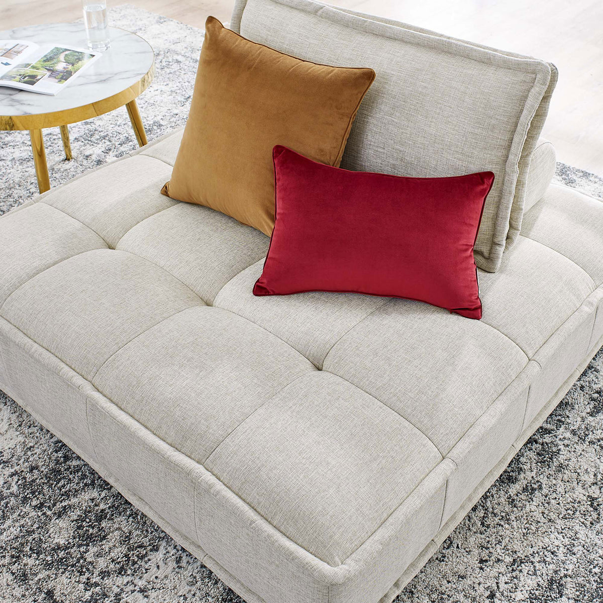 Biscuit-tufted seat in versatile beige adds plush texture and modern comfort to any space. || EEI-4725-BEI || detail_room