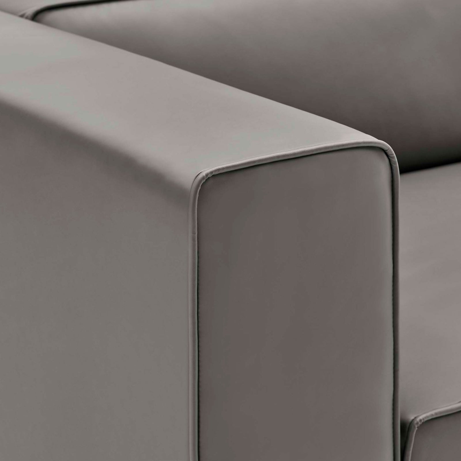 Gray vegan leather armrest with refined piping detail and generously padded edges || EEI-4788-GRY || detail_studio