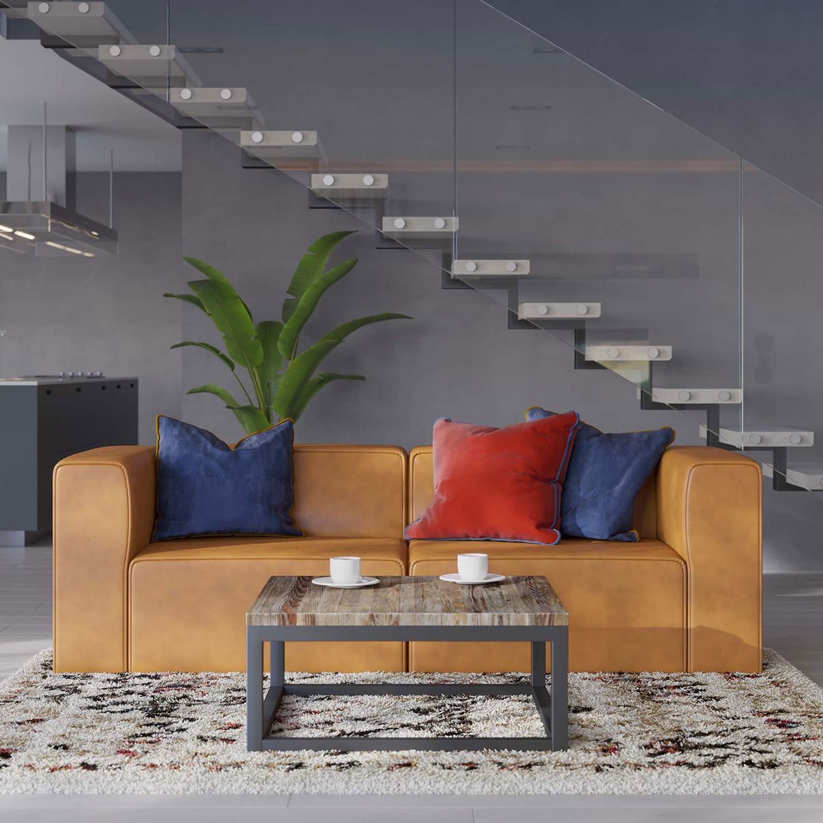Tan vegan leather loveseat centered on a textured rug with sleek metal coffee table and greenery under floating stairs || EEI-4788-TAN || front_room