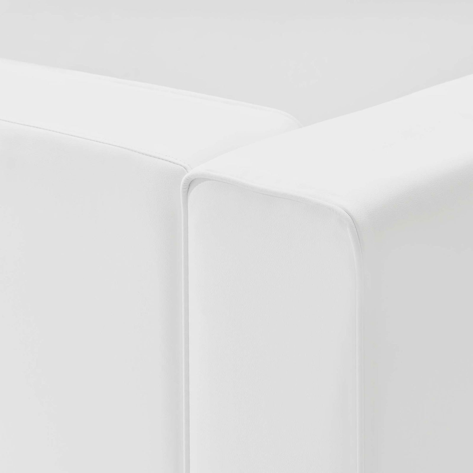 White vegan leather sofa cushions showing refined piping and neatly aligned seams between modular sections || EEI-4793-WHI || detail_studio