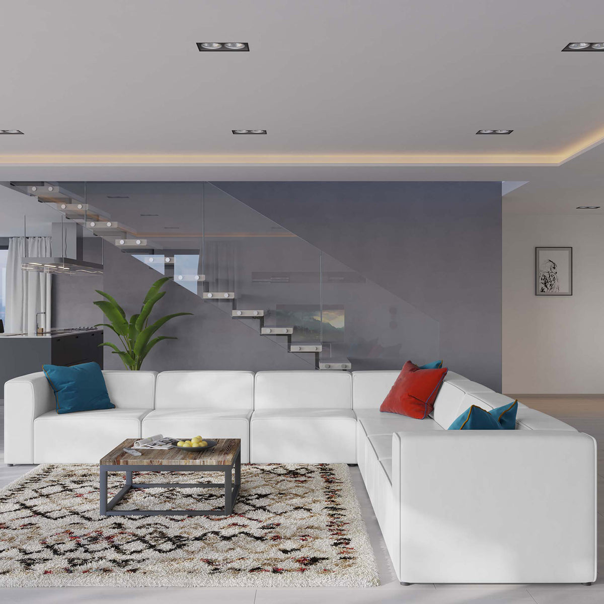White vegan leather sectional anchors a contemporary living room with textured rug and colorful pillows || EEI-4798-WHI || front_angle_room