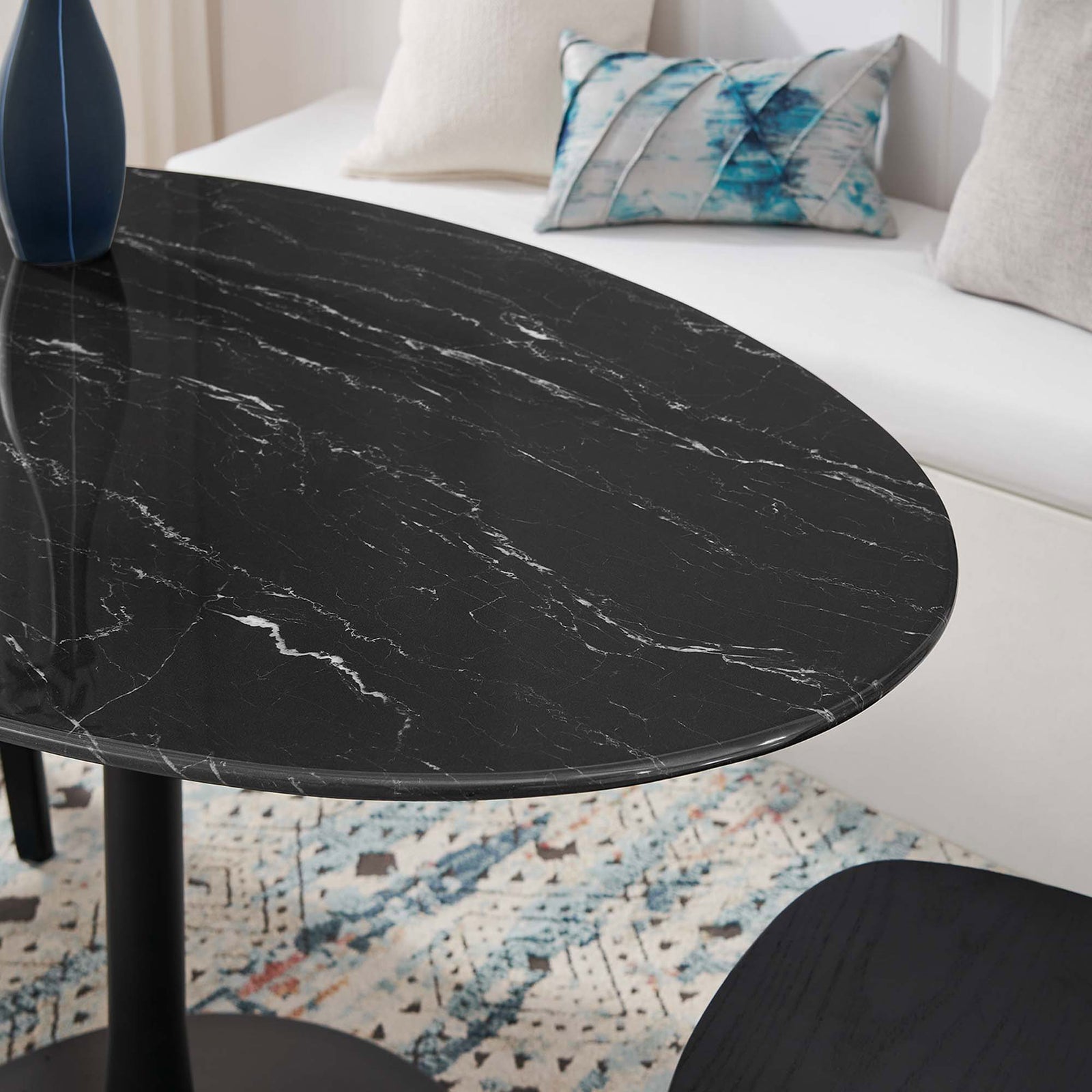 Faux marble tabletop with soft white veining paired with cozy bench seating and accent pillow || EEI-4880-BLK-BLK || detail_room