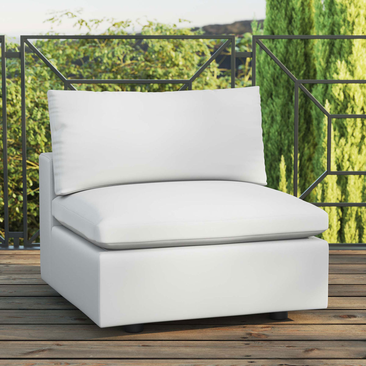 White outdoor armless chair styled on a wood deck, bringing bright resort-inspired comfort outside || EEI-4902-WHI || front_angle_room