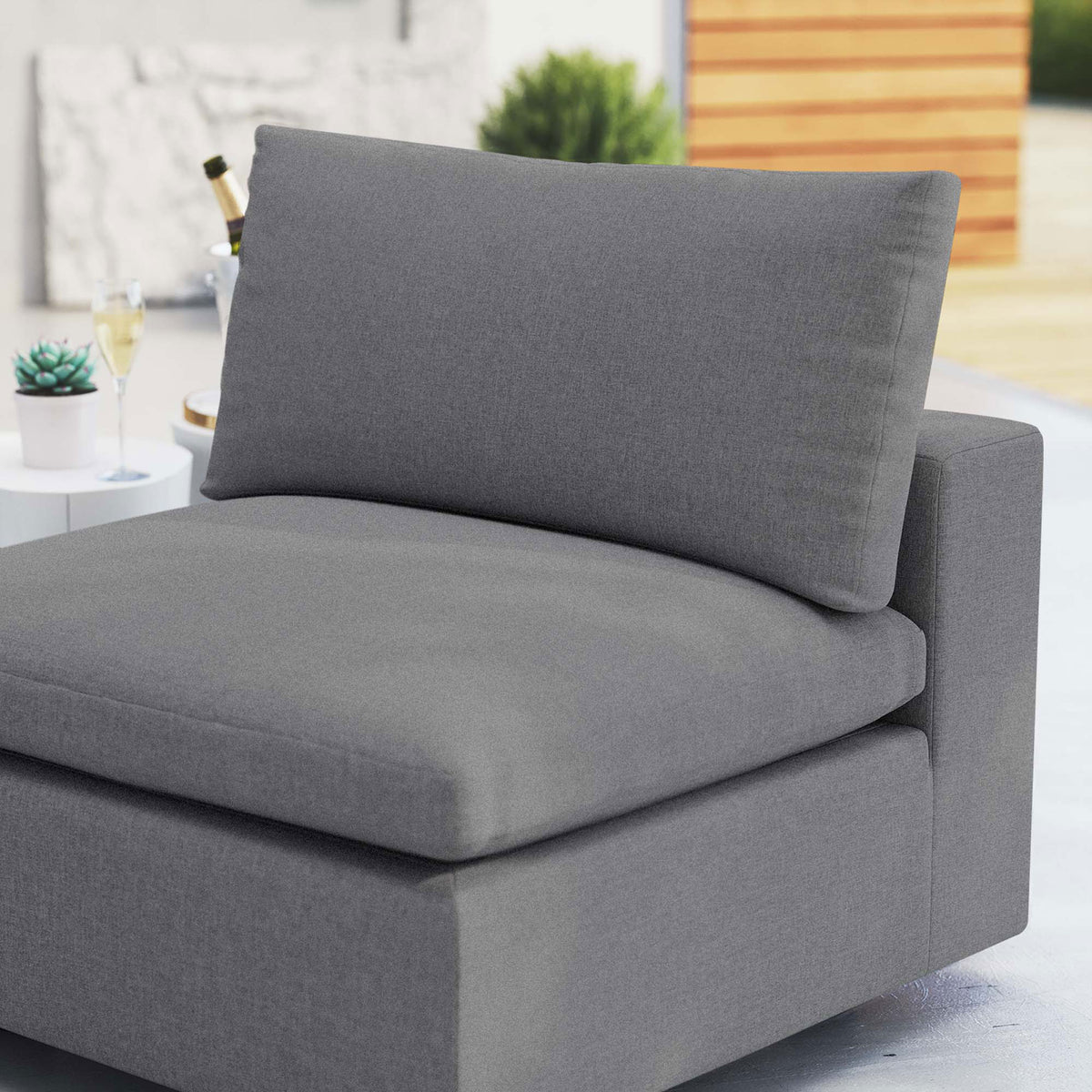 Slate gray Sunbrella cushions in a patio setting, emphasizing plush comfort and soft texture || EEI-4905-SLA || detail_room
