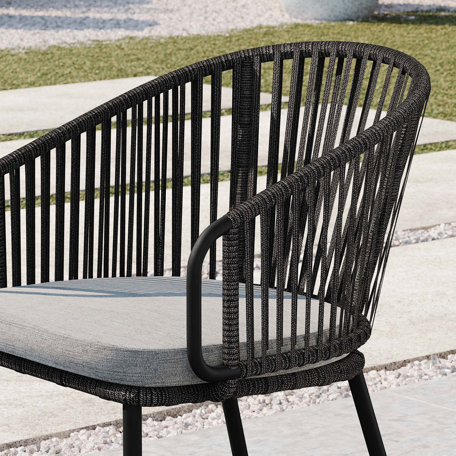 Curved rope-woven arm and back of Harbor patio chair with smooth frame and gray cushion || EEI-5033-CHA-GRY || detail_room