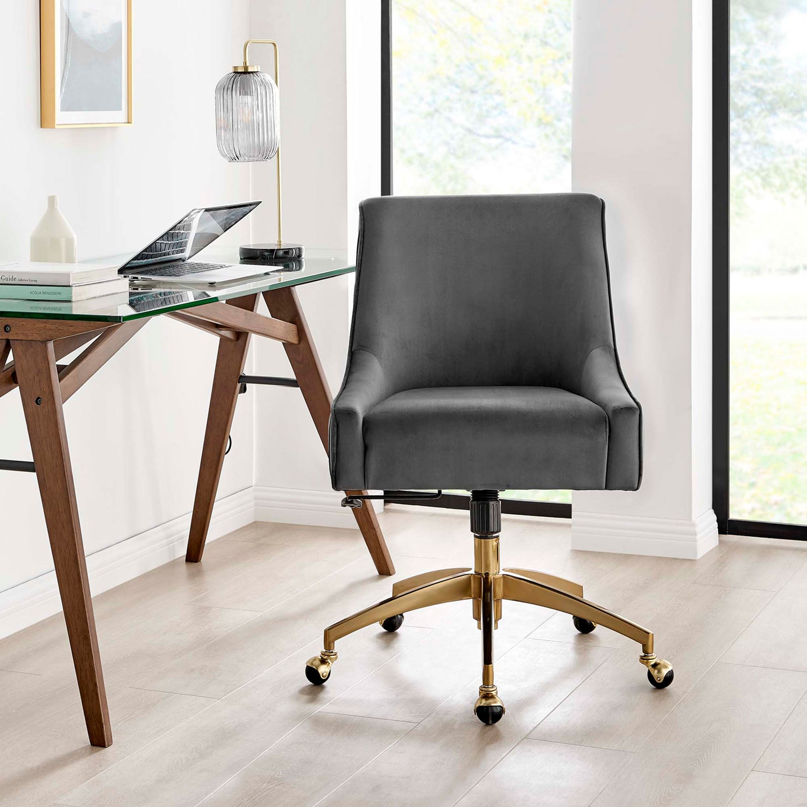 Gray velvet office chair with gold base styled at a glass desk in a bright modern workspace || EEI-5080-GRY || front_room