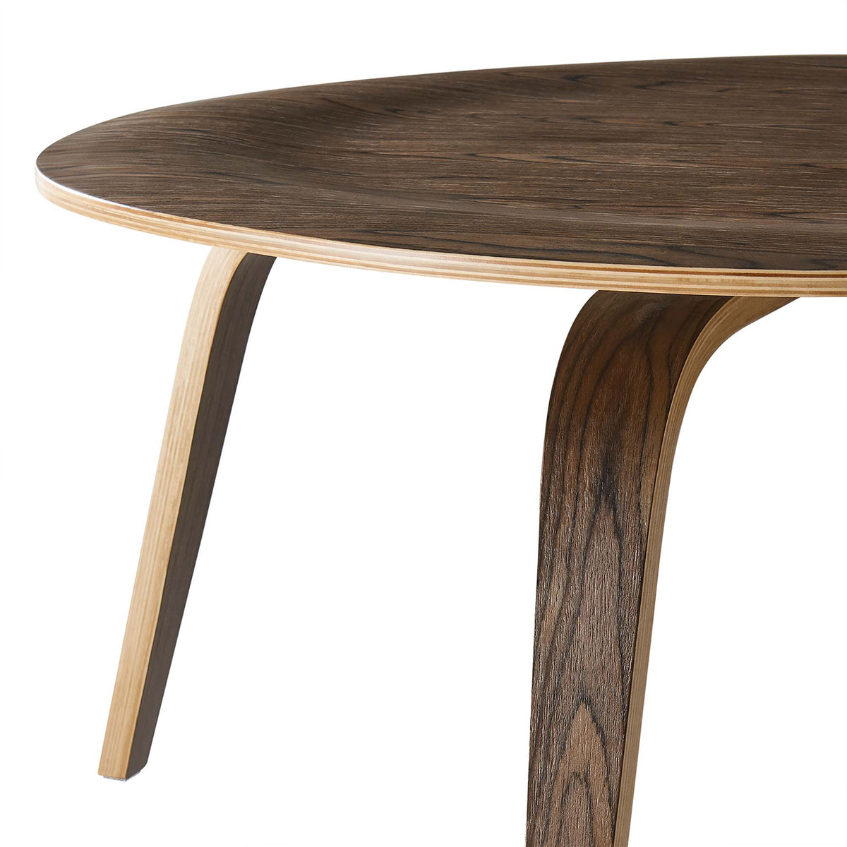 Curved plywood legs and a slim layered tabletop edge reveal thoughtful craftsmanship