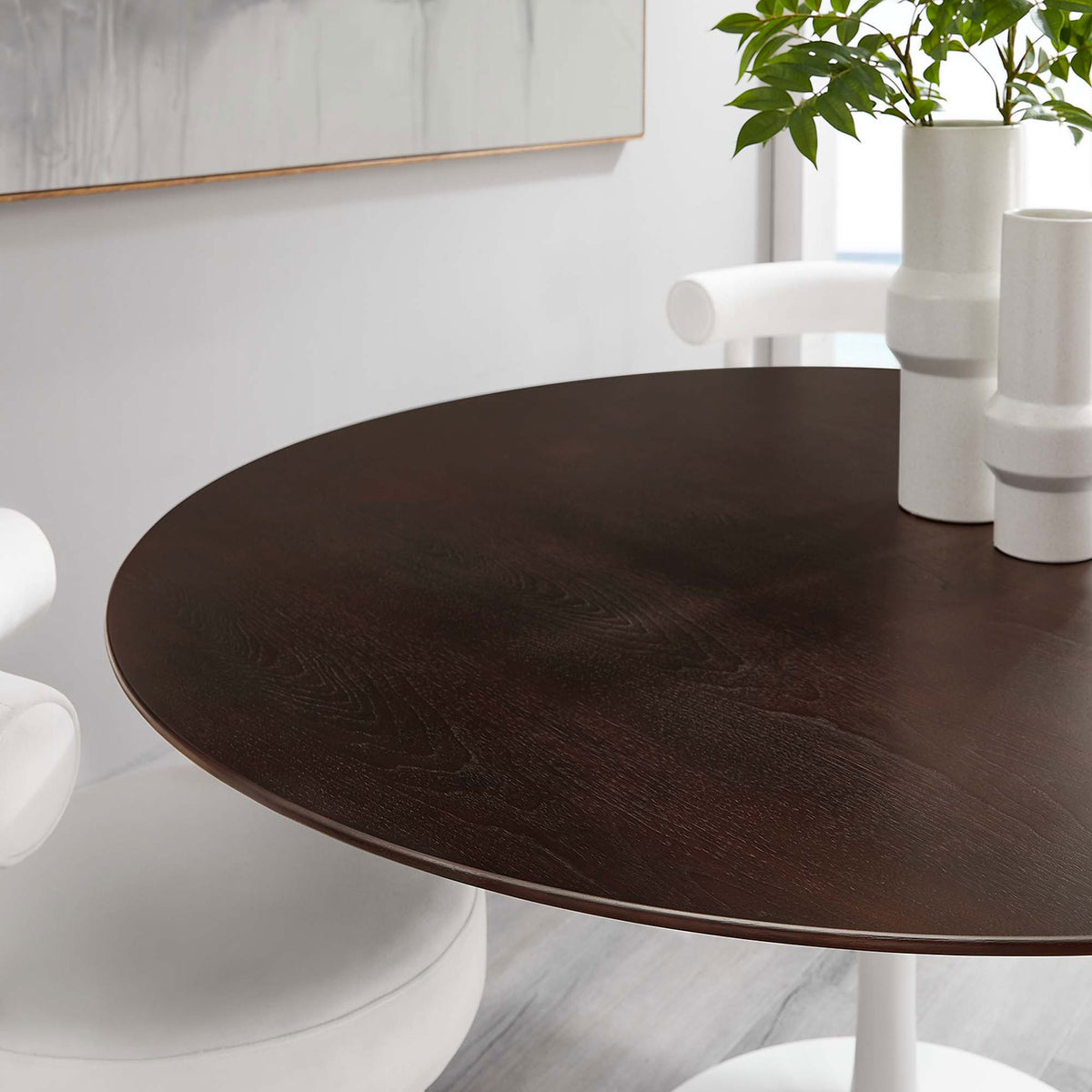 Close up of expansive wood tabletop styled with white vases and curved dining chairs || EEI-5175-WHI-CHE || detail_room