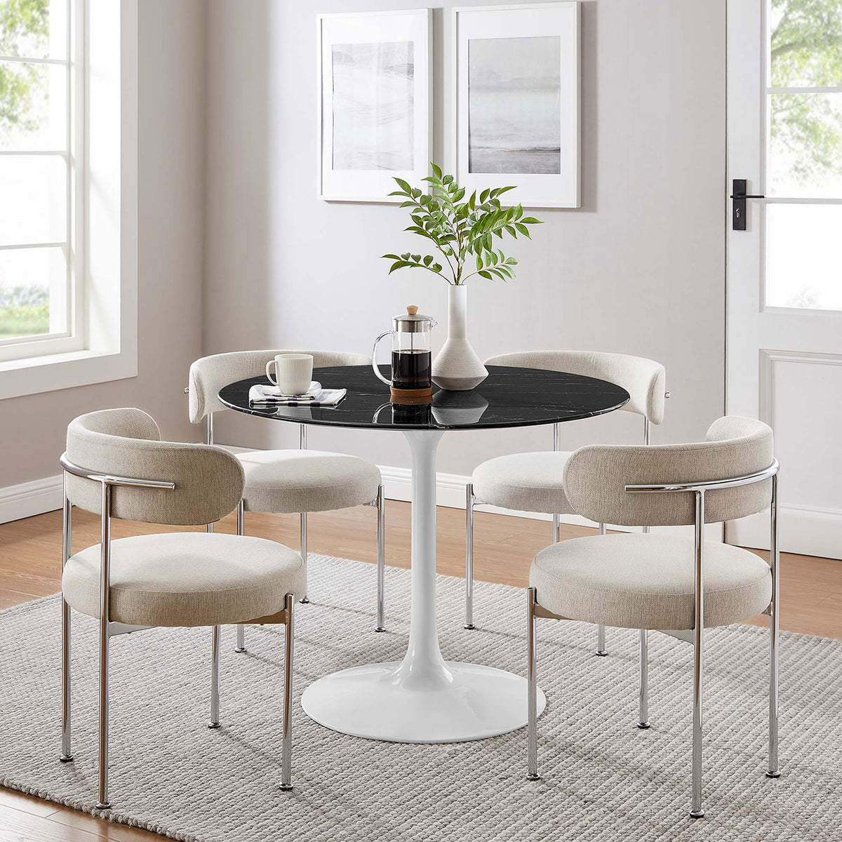 40 inch black faux marble dining table paired with four cream chairs in a light filled dining room || EEI-5181-WHI-BLK || front_room