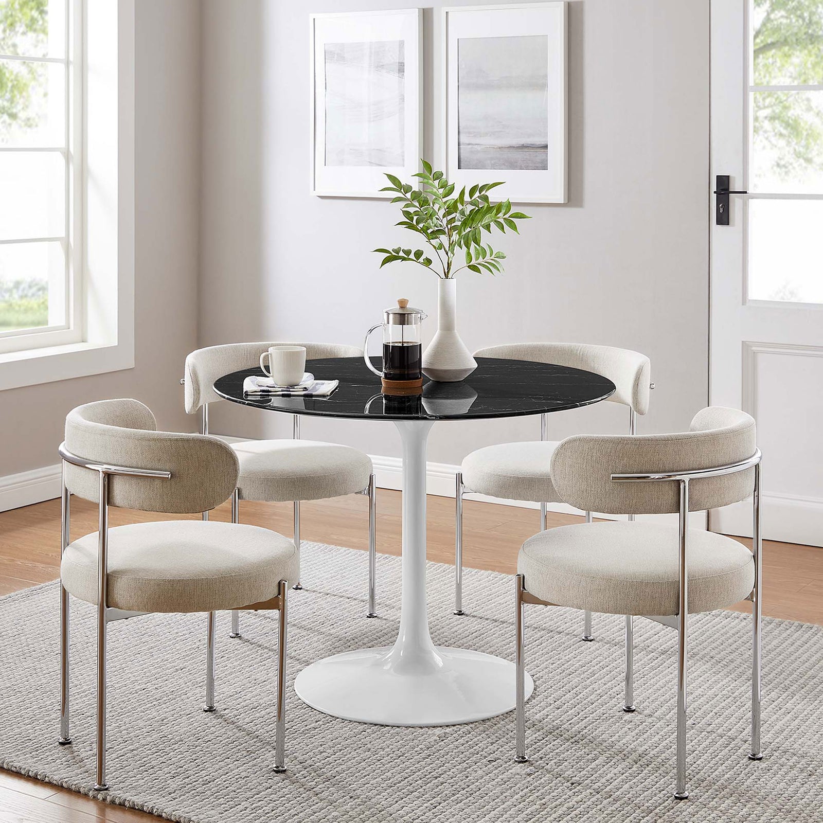 40 inch black faux marble dining table paired with four cream chairs in a light filled dining room || EEI-5181-WHI-BLK || front_room