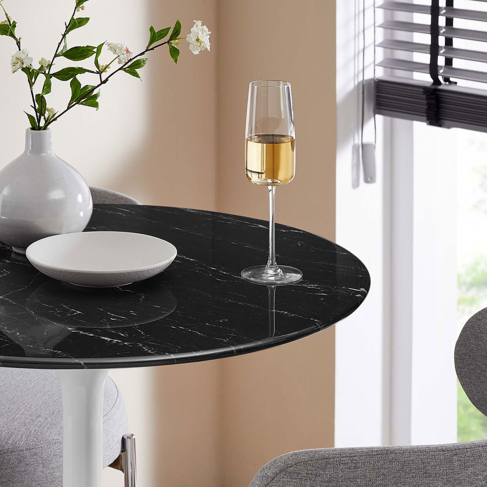 Glossy black faux marble surface adds a luxe accent to modern bar settings || EEI-5203-WHI-BLK || detail_room