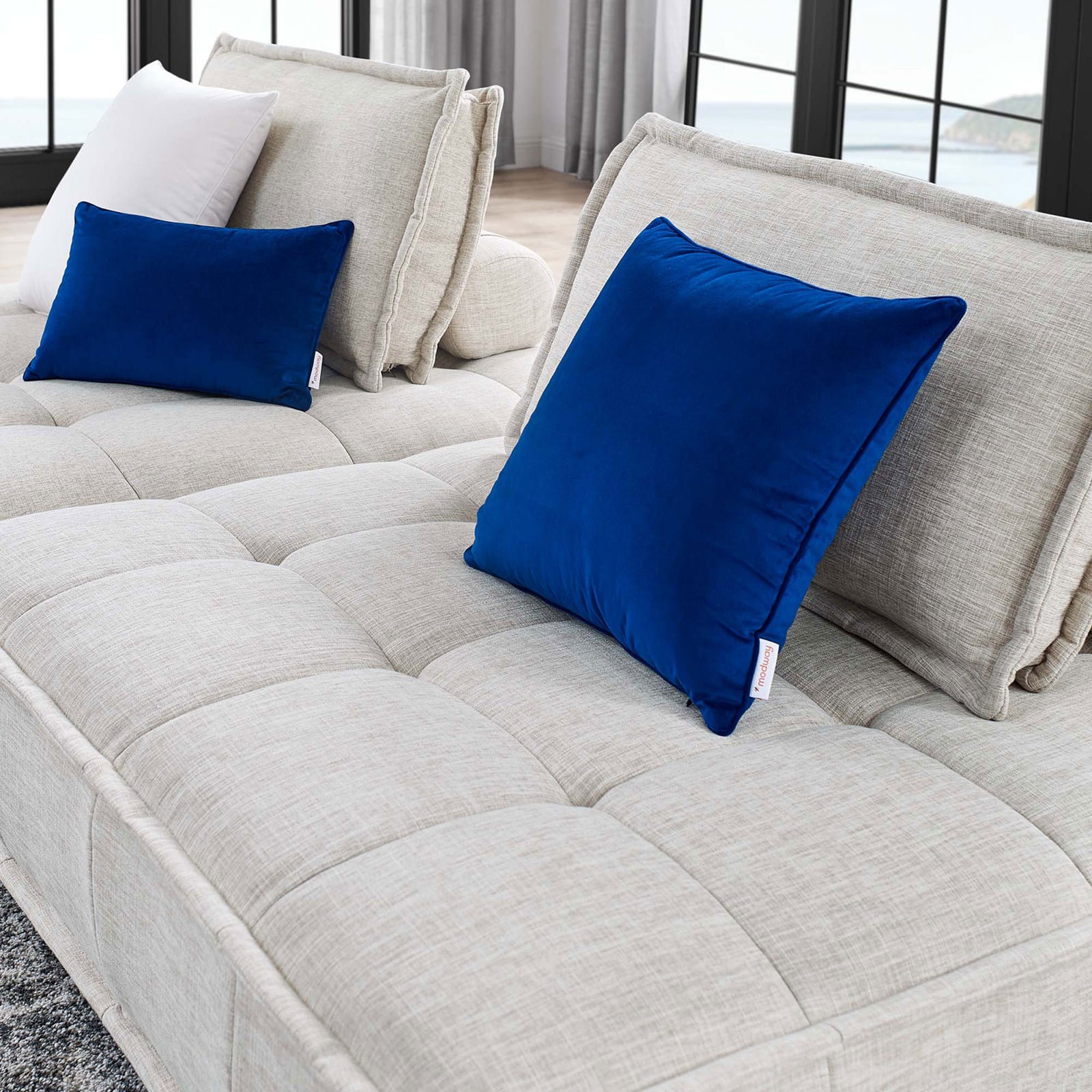 Tufted beige seat and plush back cushions showcasing the loveseat soft, inviting fabric texture. || EEI-5204-BEI || detail_room