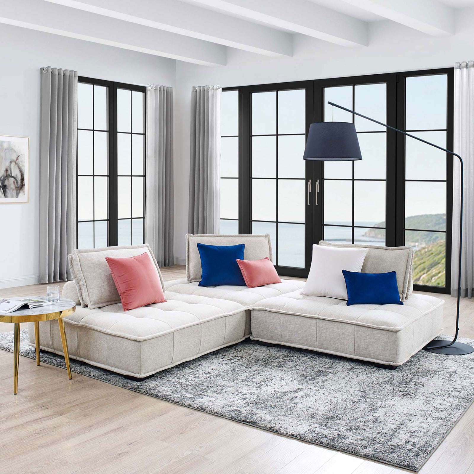 Saunter modular beige sofa in an L-shaped layout with gold side table in a contemporary living room || EEI-5206-BEI || front_angle_room