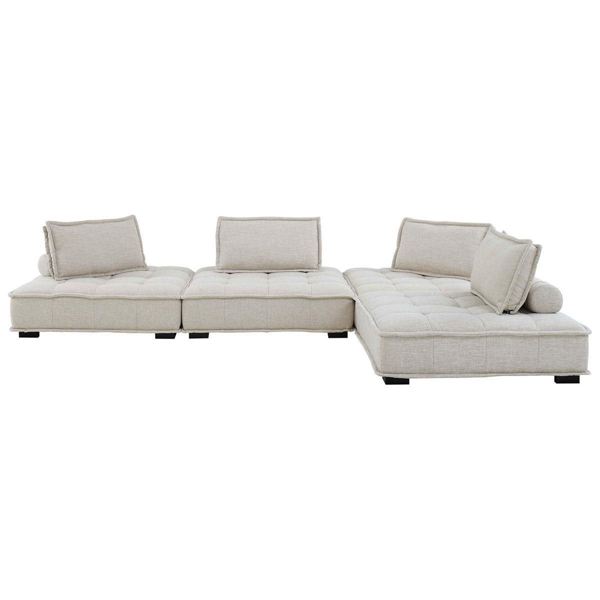 Low-profile beige tufted sectional sofa with four modular seats, back cushions, and bolster pillows || EEI-5208-BEI || front_studio