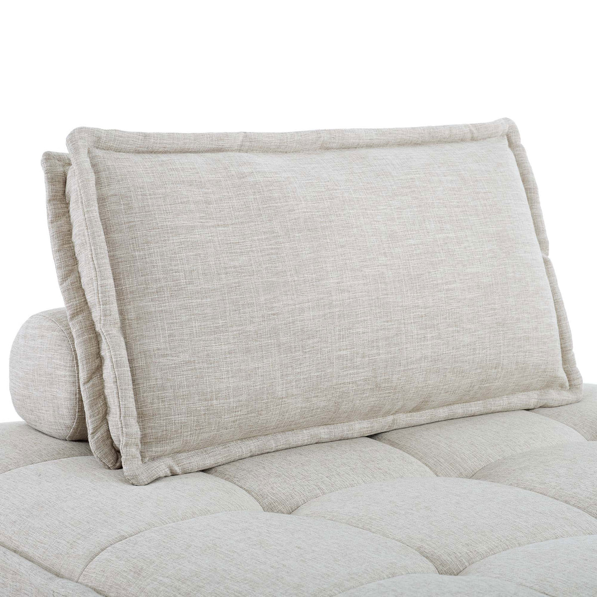 Textured beige back cushion with tailored flange edging resting on the tufted modular seat || EEI-5210-BEI || detail_studio