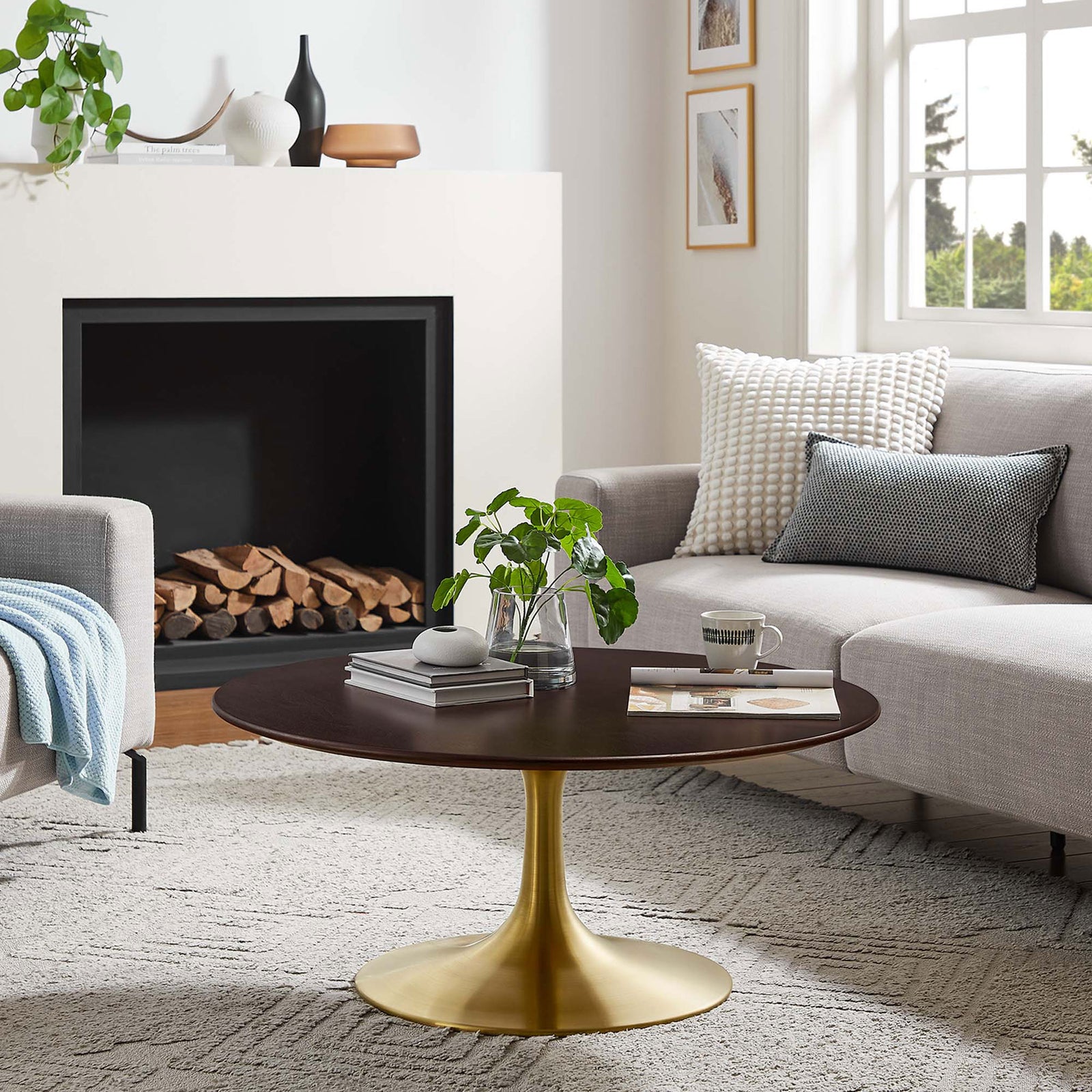 Mid-century round coffee table elevates a cozy living space with warm wood and gold tones || EEI-5244-GLD-CHE || front_angle_room