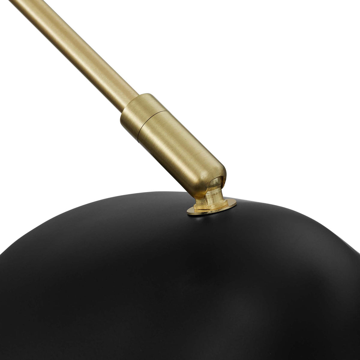 Satin brass joint and matte black shade create a refined mid-century contrast. || EEI-5294-BLK || detail_studio
