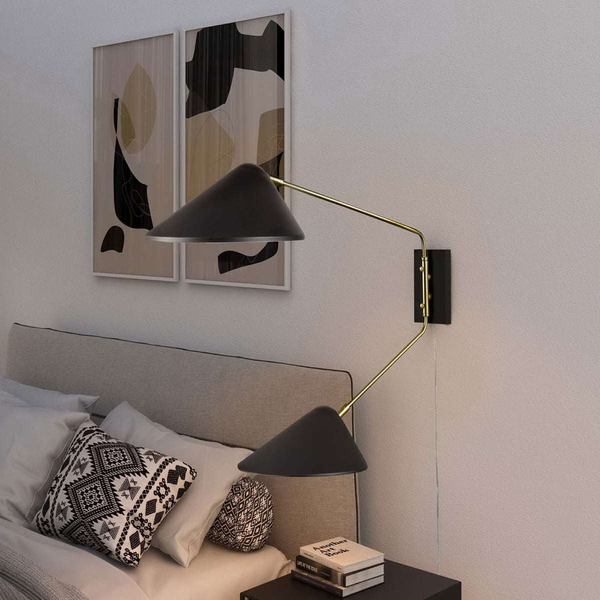 Journey 2-light swing arm sconce extends over a bedside table for focused reading light. || EEI-5294-BLK || front_angle_on_room