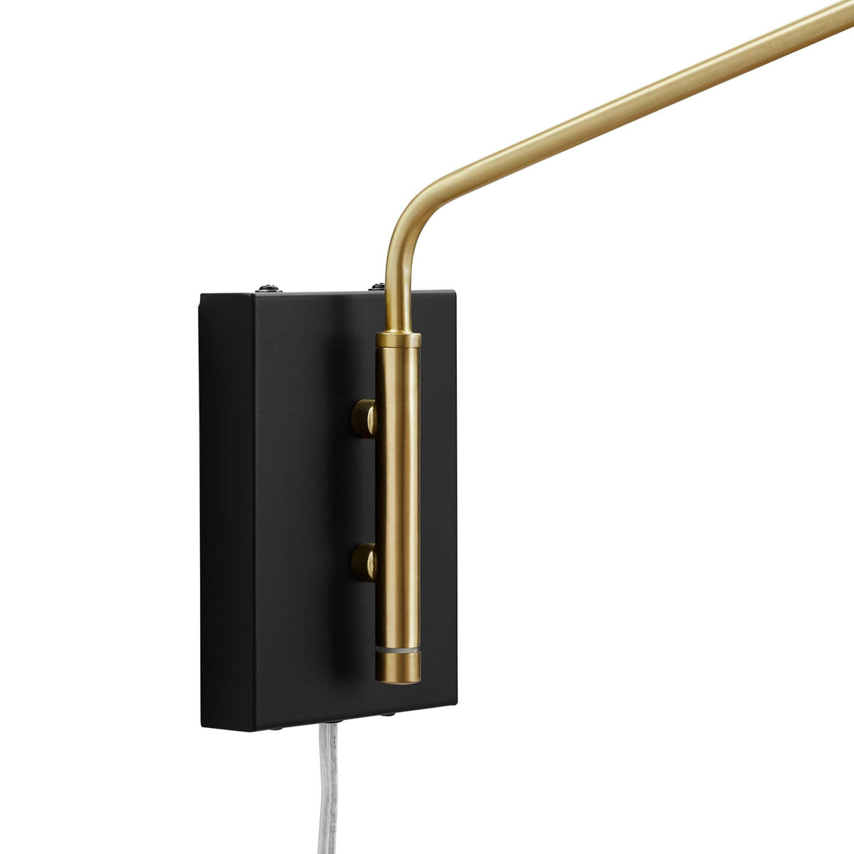 Matte black backplate and cylindrical brass arm mount add crisp architectural lines. || EEI-5295-BLK || detail_studio