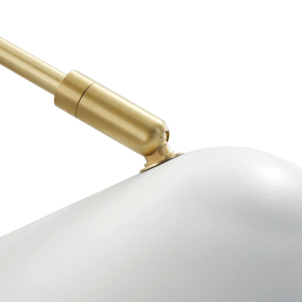 Polished brass knuckle at the shade delivers smooth swivel movement and refined detail. || EEI-5296-WHI || detail_studio