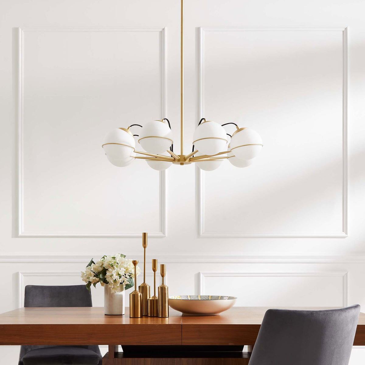 Satin brass chandelier lends modern elegance over dining, pairing opal globes with a minimalist frame || EEI-5307-OPA-GLD || front_room