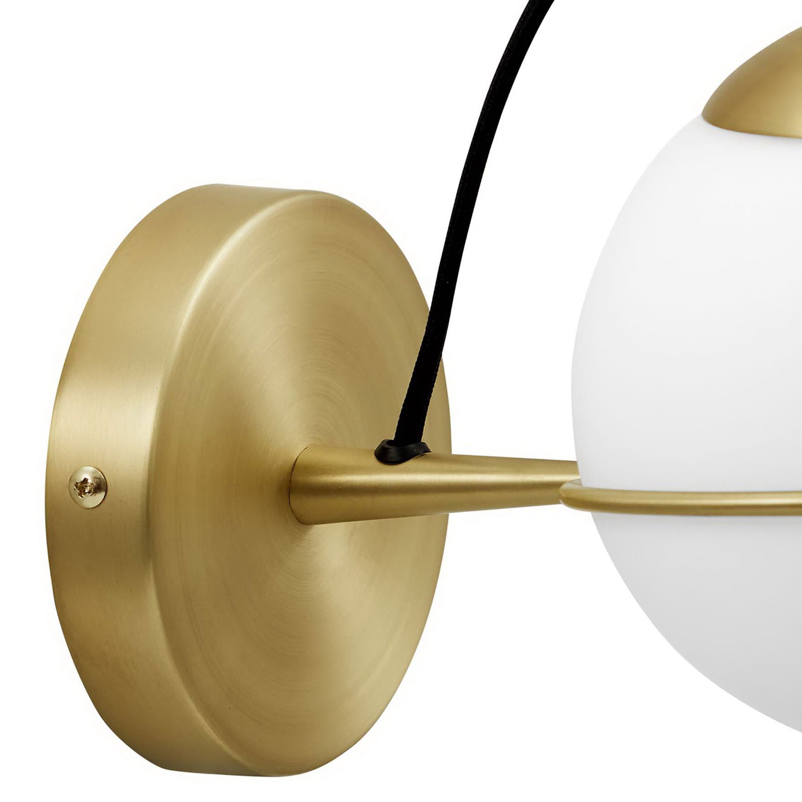 Satin brass wall plate and arm with subtle brushed finish supporting the opal glass globe || EEI-5308-OPA-GLD || detail_studio