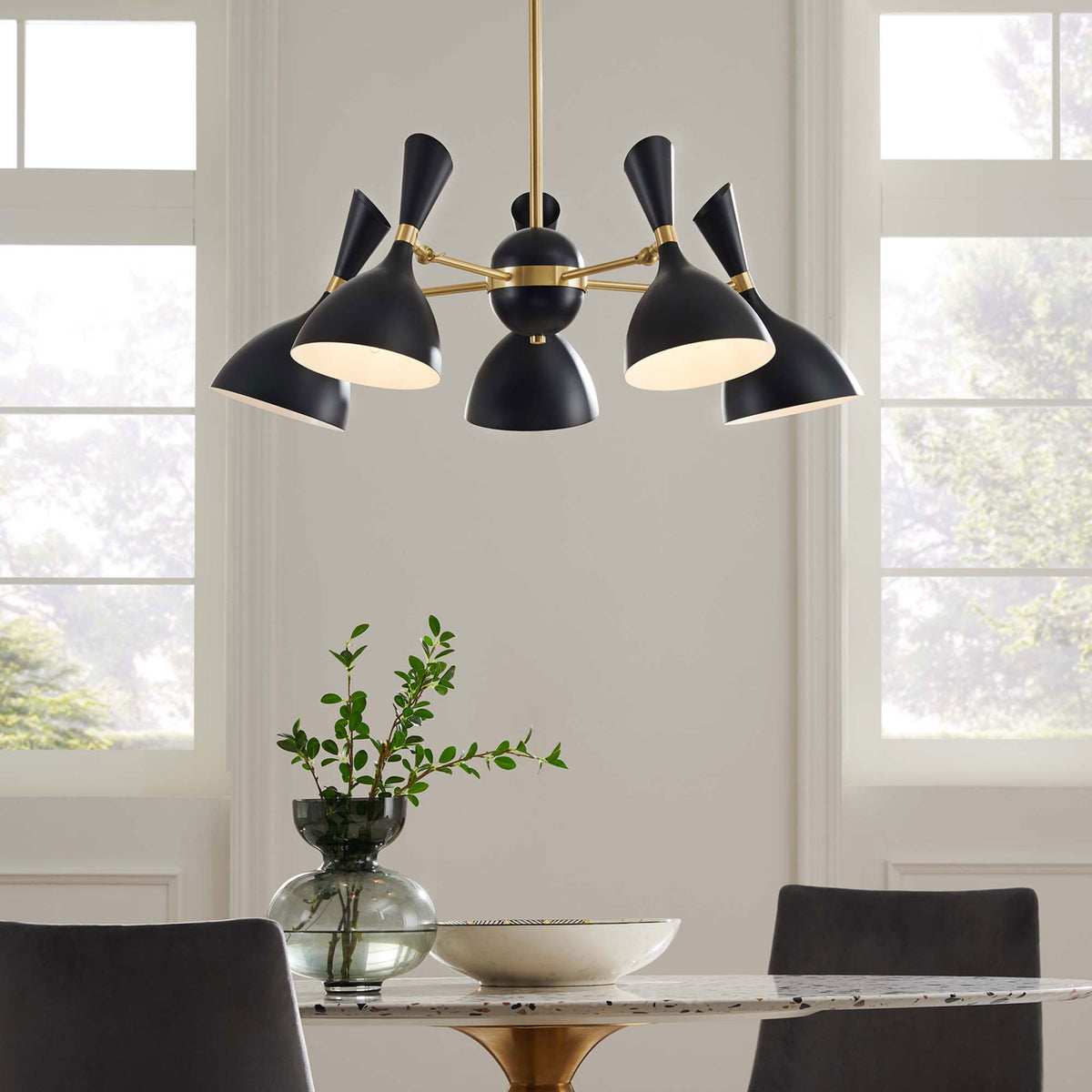 Warm glow highlights the black shades and brass accents above the table || EEI-5310-BLK || front_on_room