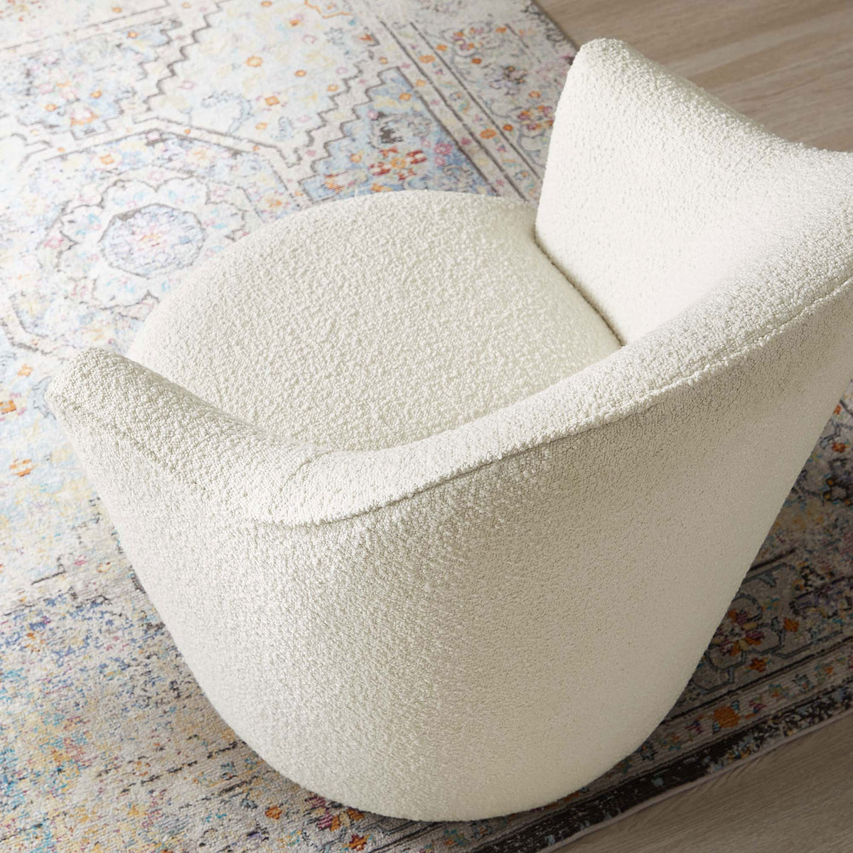 Rounded seat and contoured back cradle you in comfort with soft, tactile boucle || EEI-5311-WHI || detail_room
