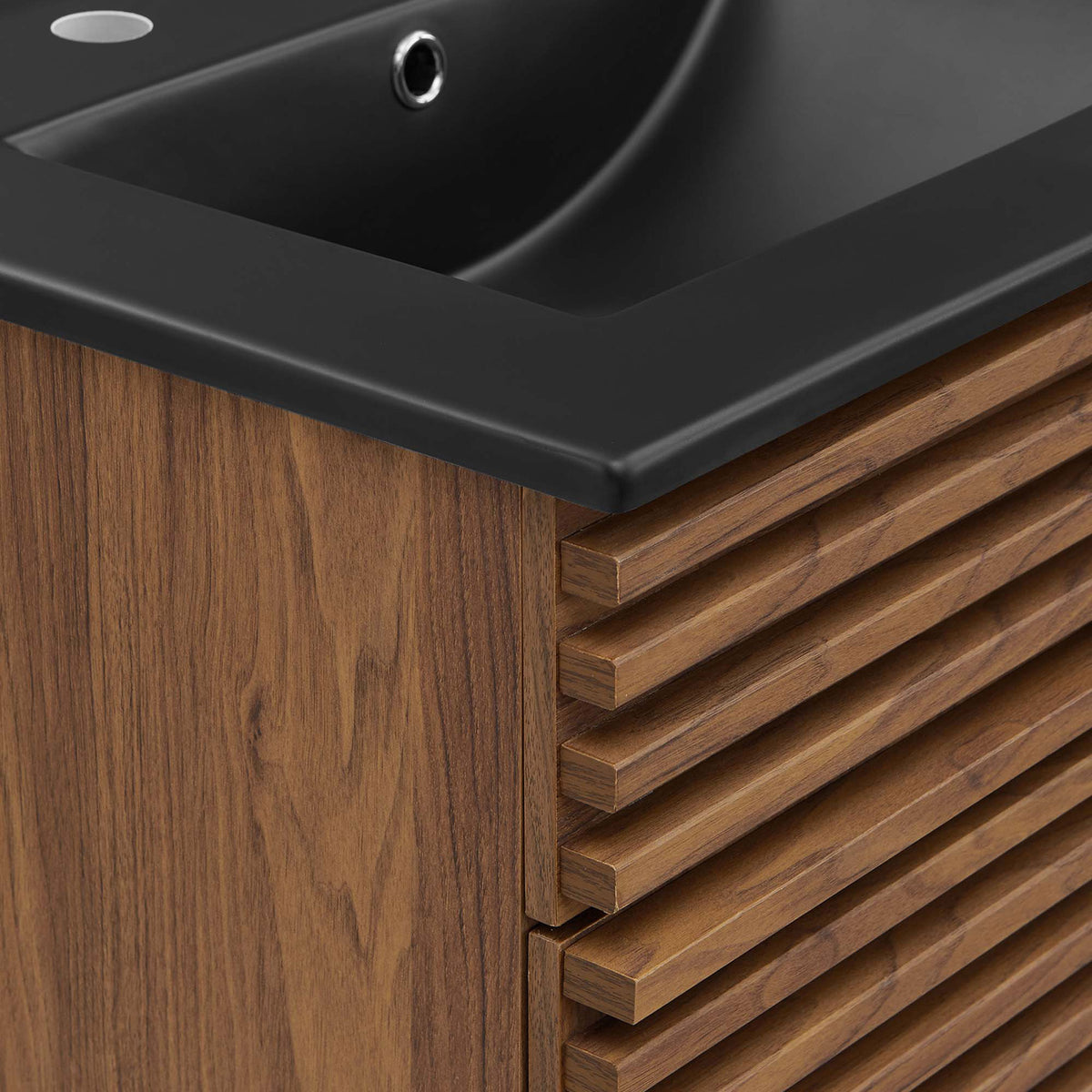 Textured slatted facade meets a smooth black countertop edge in a modern finish || EEI-5350-WAL-BLK || detail_studio