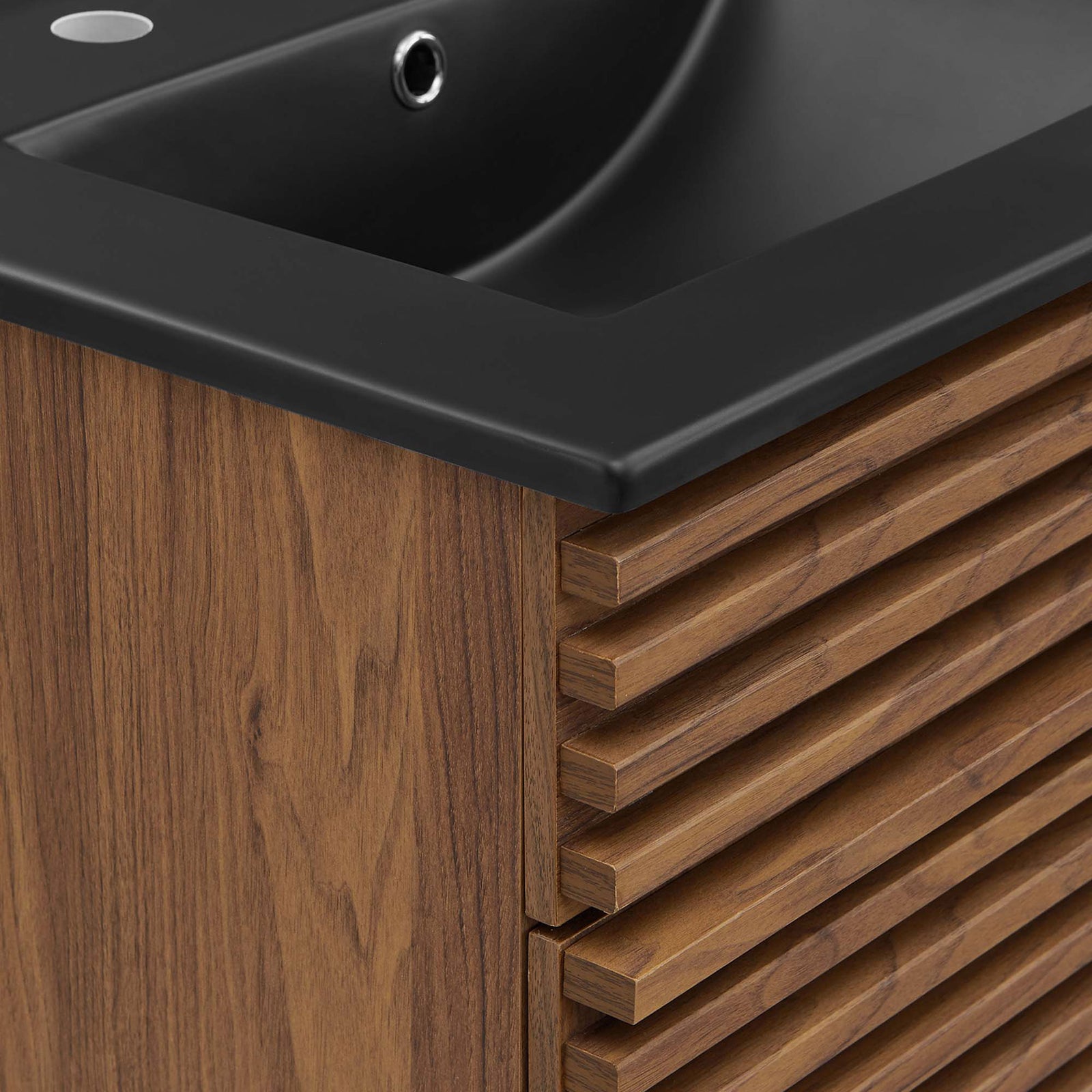 Textured slatted facade meets a smooth black countertop edge in a modern finish || EEI-5350-WAL-BLK || detail_studio