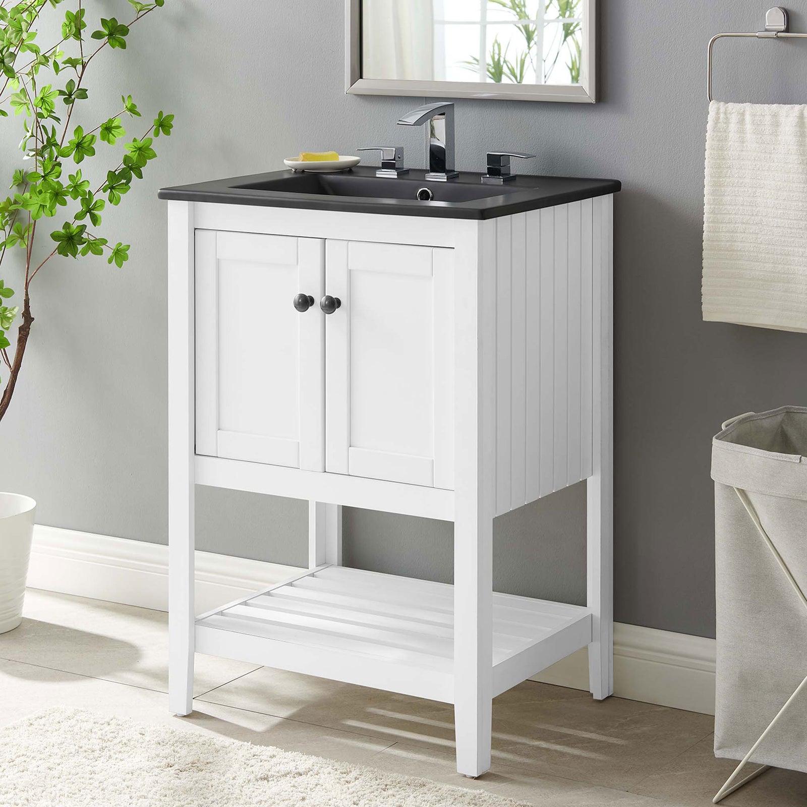 Space-saving 24-inch vanity balances farmhouse charm and modern edge in crisp white and black || EEI-5358-WHI-BLK || front_angle_room