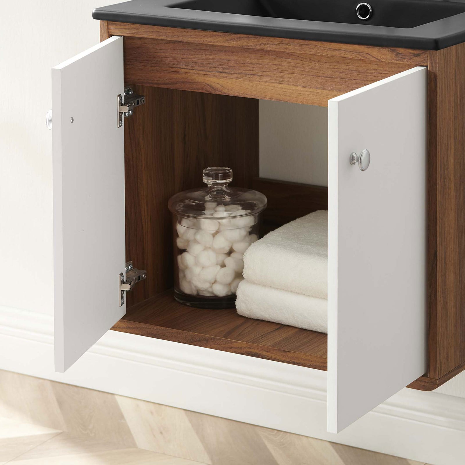Open cabinet keeps bathroom essentials tidy behind soft-close doors beneath the integrated sink || EEI-5362-WHI-BLK || storage_open_room