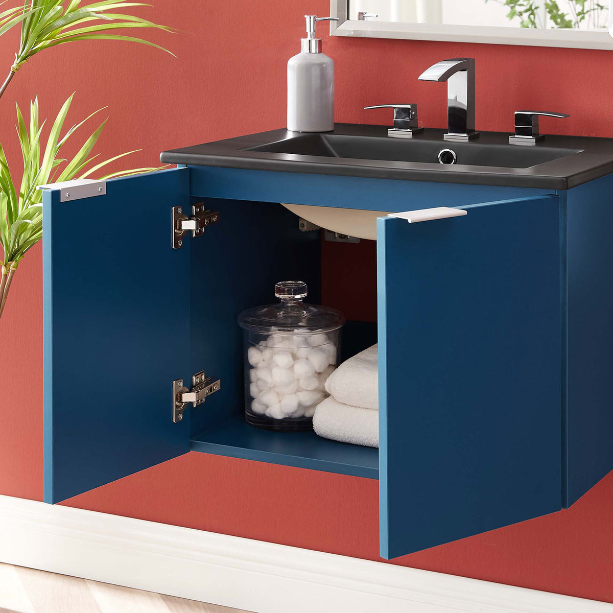 Wall-mounted vanity with doors open for easy storage access || EEI-5370-NAV-BLK || front_open_room