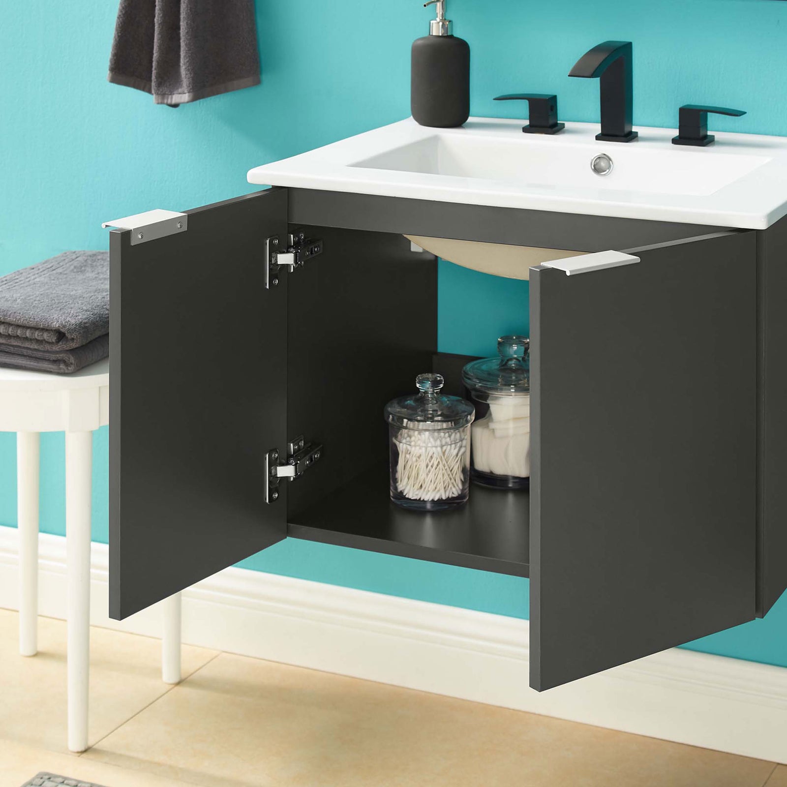 Wall-mounted vanity shows spacious interior storage for everyday essentials || EEI-5379-GRY-WHI || front_open_room
