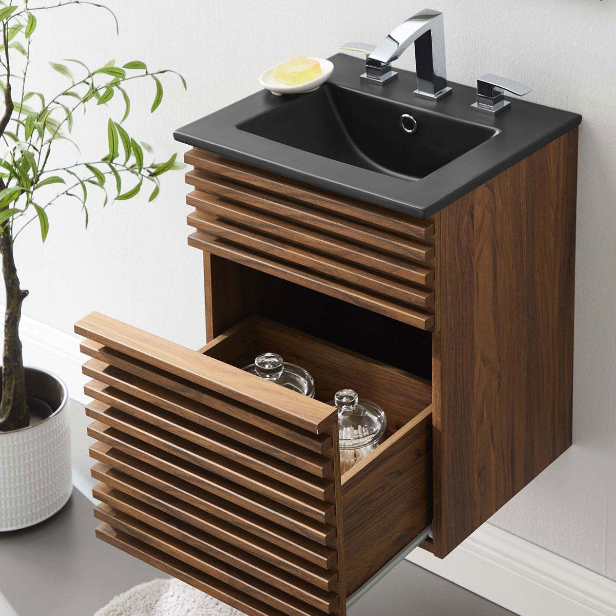 Smooth-glide drawer keeps essentials handy beneath the matte black sink in a compact footprint. || EEI-5390-WAL-BLK || top_open_room
