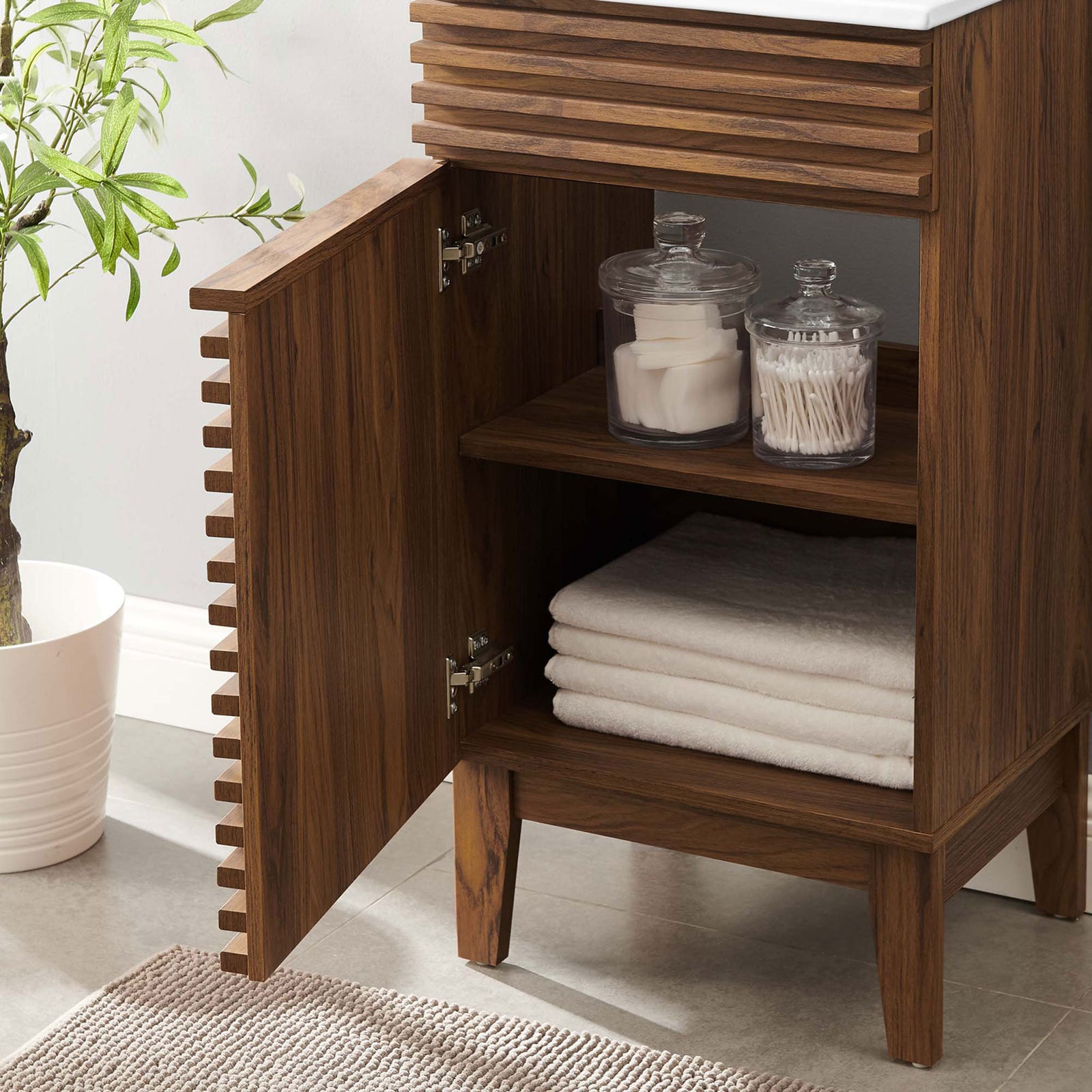Open cabinet reveals roomy shelves for towels and bath essentials. || EEI-5420-WAL-WHI || storage_open_room