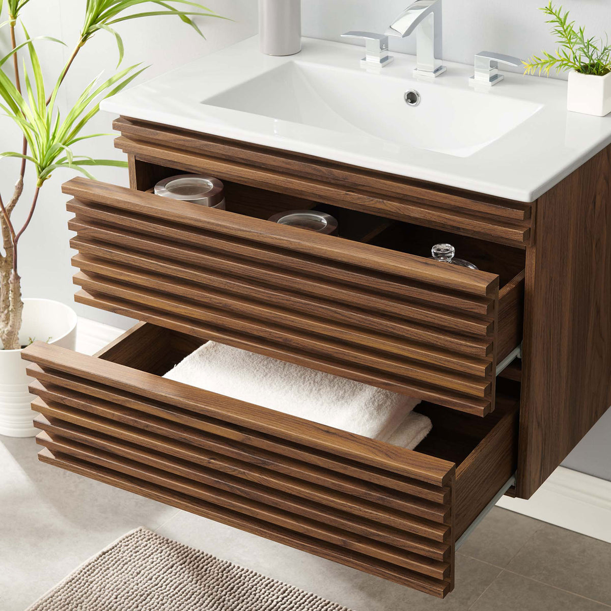 Spacious drawers glide open to organize towels and toiletries in this floating 30-inch vanity. || EEI-5421-WAL-WHI || storage_open_room