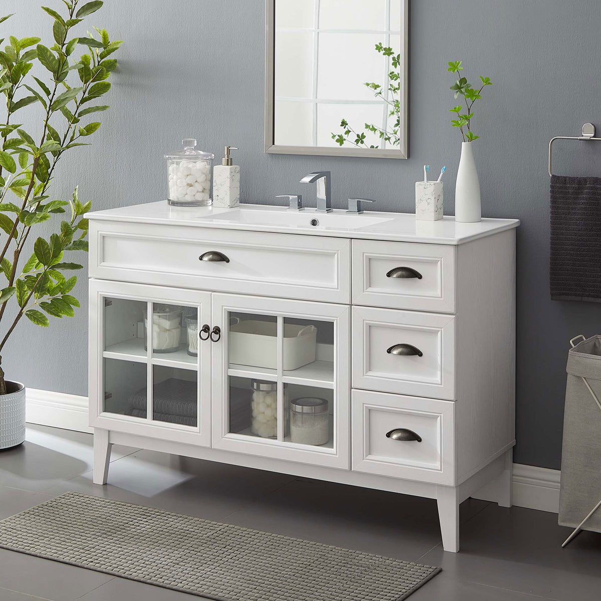 Refined coastal look with windowpane doors, three drawers, and a durable sink top || EEI-5427-WHI-WHI || front_angle_room