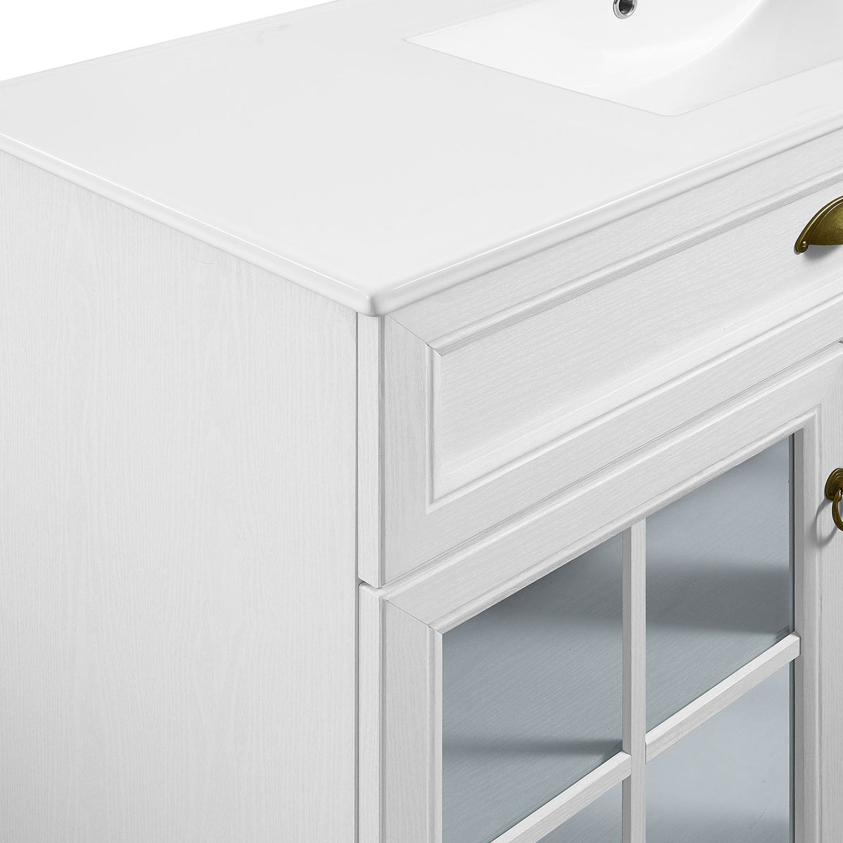 Crisp frame detailing and brushed brass cup pull against the bright white finish || EEI-5427-WHI-WHI || detail_studio