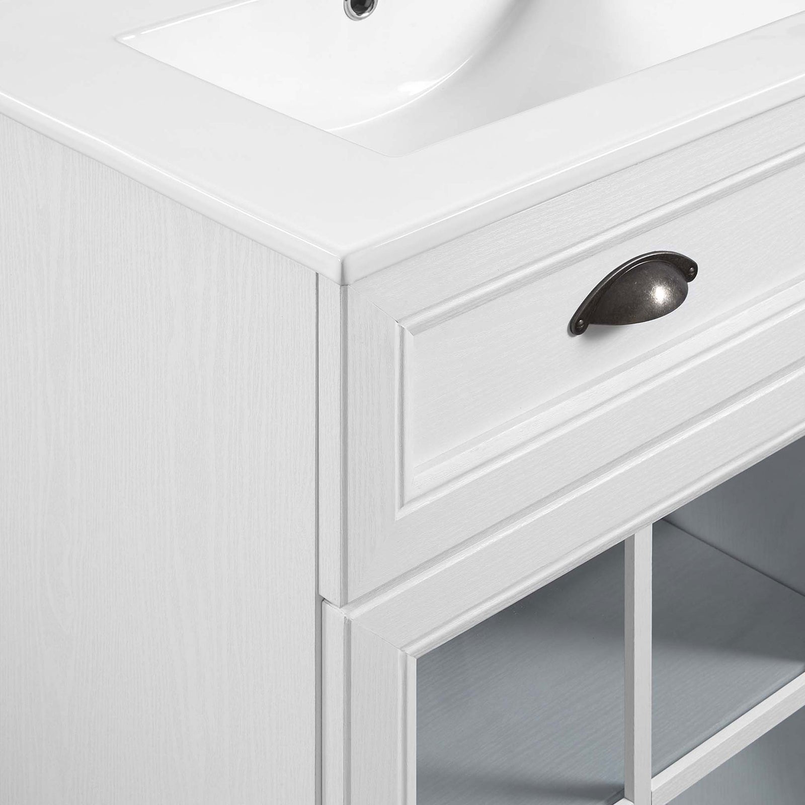 Textured white wood-look finish with framed drawer front and classic cup pull hardware || EEI-5428-WHI-WHI || detail_studio