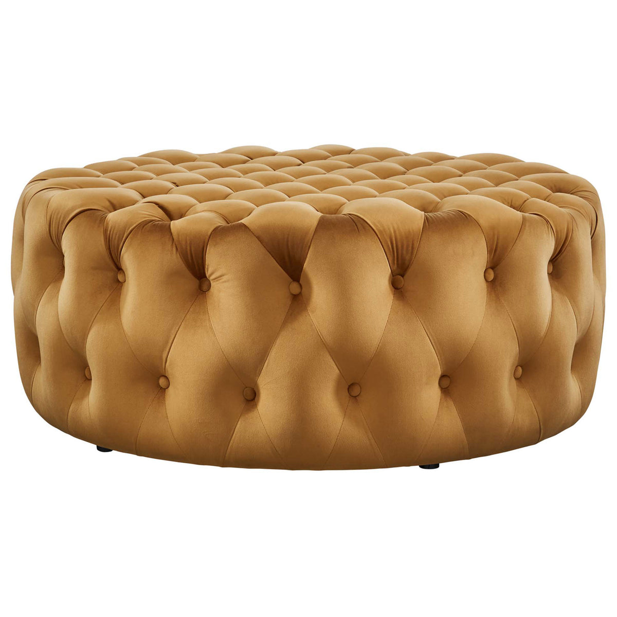 Low profile cognac velvet ottoman showcasing the richly tufted sides and generous round silhouette || EEI-5469-COG || side_studio