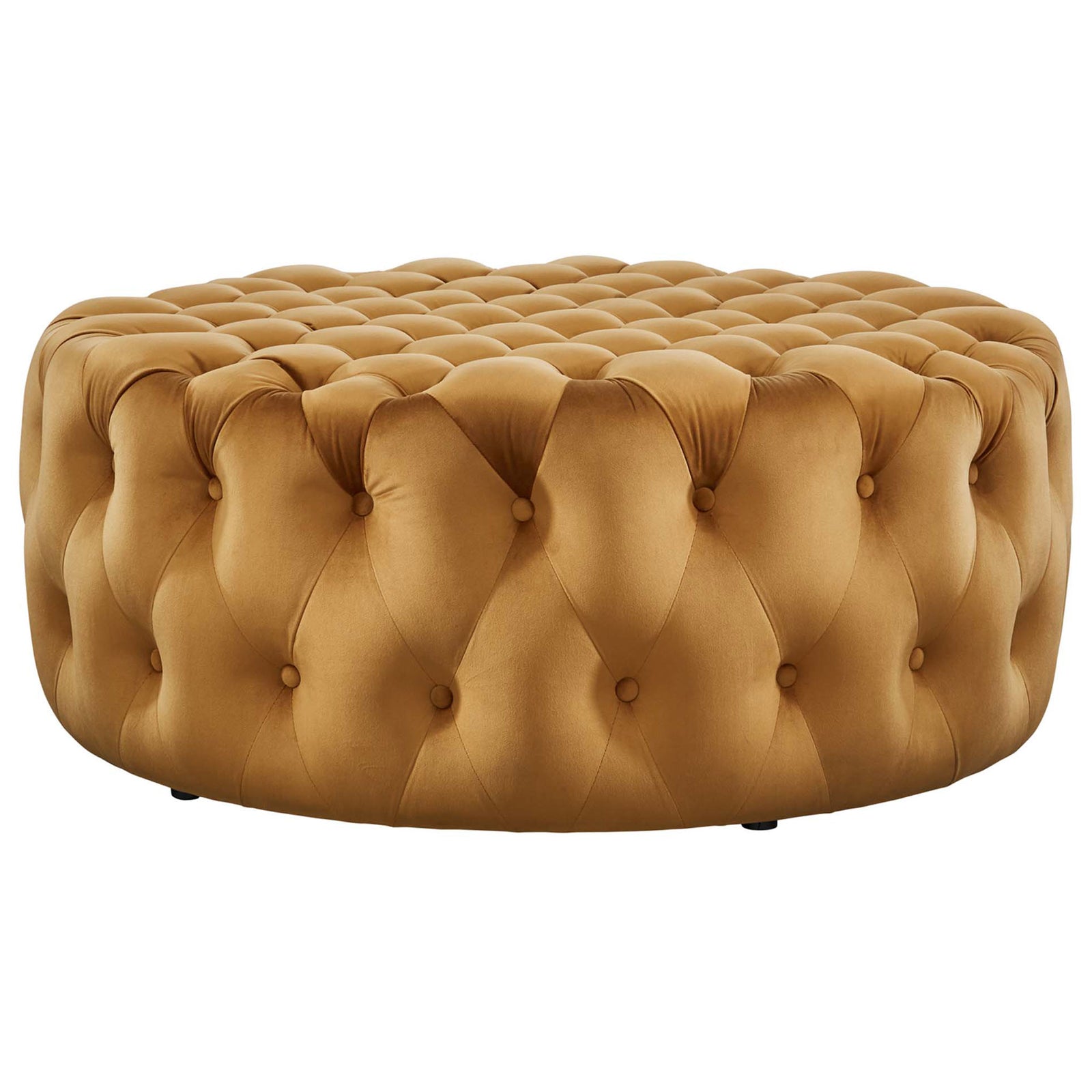 Low profile cognac velvet ottoman showcasing the richly tufted sides and generous round silhouette || EEI-5469-COG || side_studio