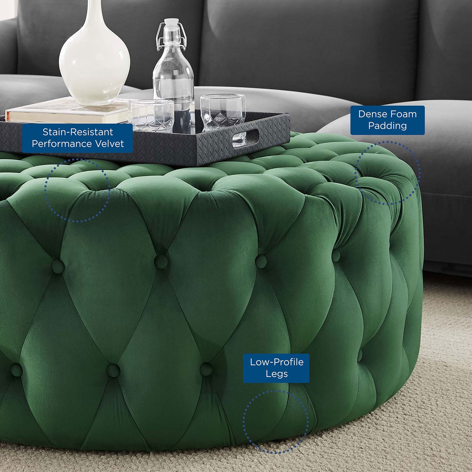 Feature callouts on emerald velvet ottoman showing stain resistance, dense foam, and low profile legs || EEI-5469-EME || callout_room