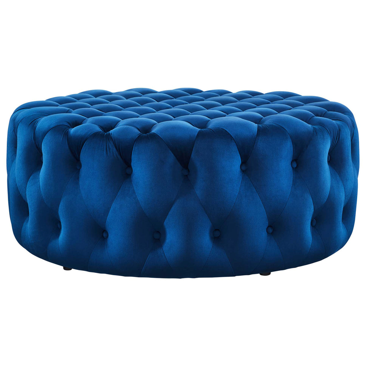 Low profile circular ottoman in rich navy performance velvet shows allover tufting for a tailored, modern look || EEI-5469-NAV || front_angle_studio