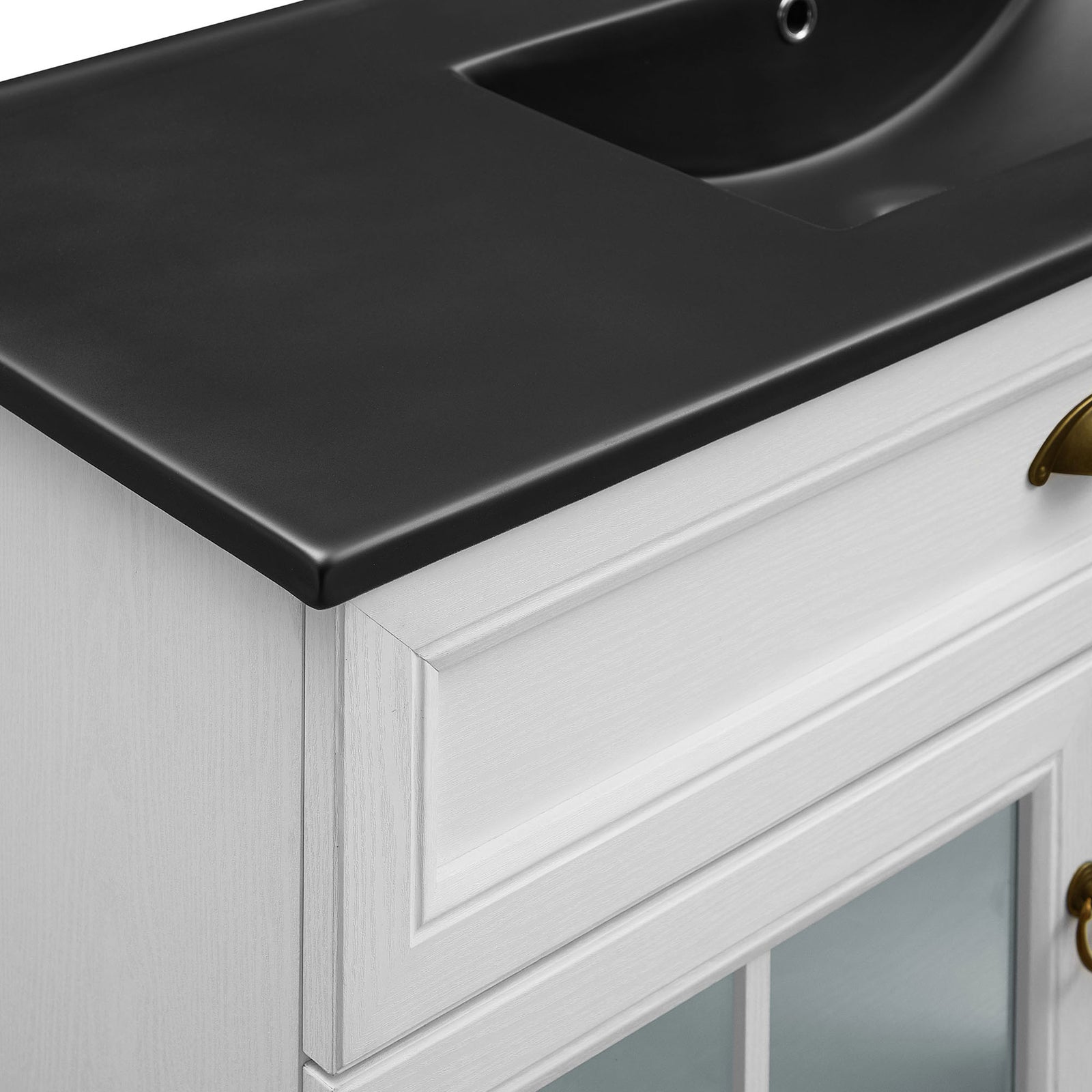 Smooth black countertop edge and framed drawer detailing for a polished, elevated look || EEI-5479-WHI-BLK || detail_studio