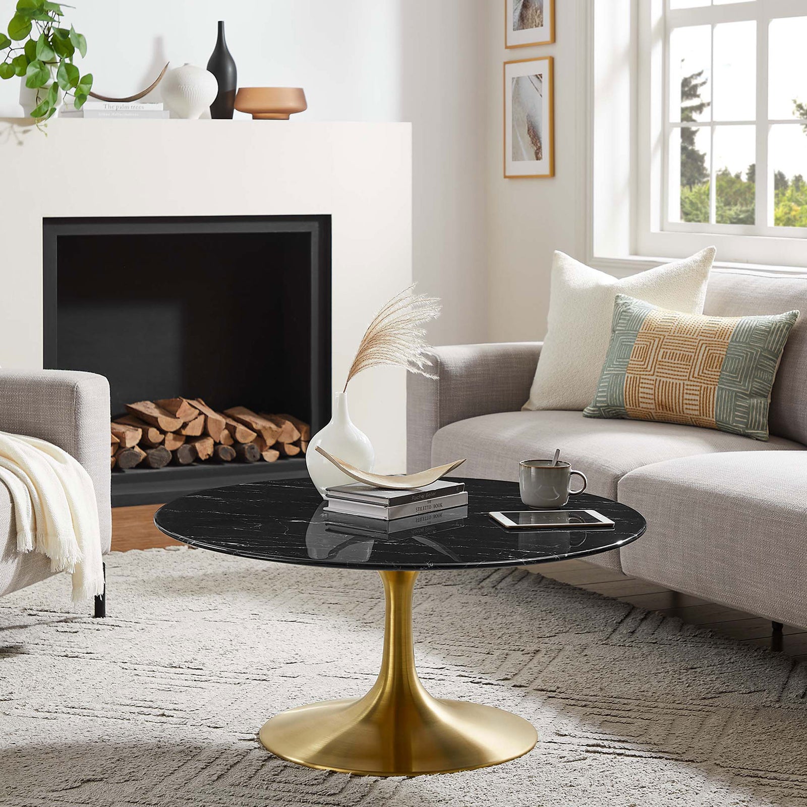Elegant black faux marble coffee table brings warm gold accents and modern polish to your living room || EEI-5521-GLD-BLK || front_angle_room
