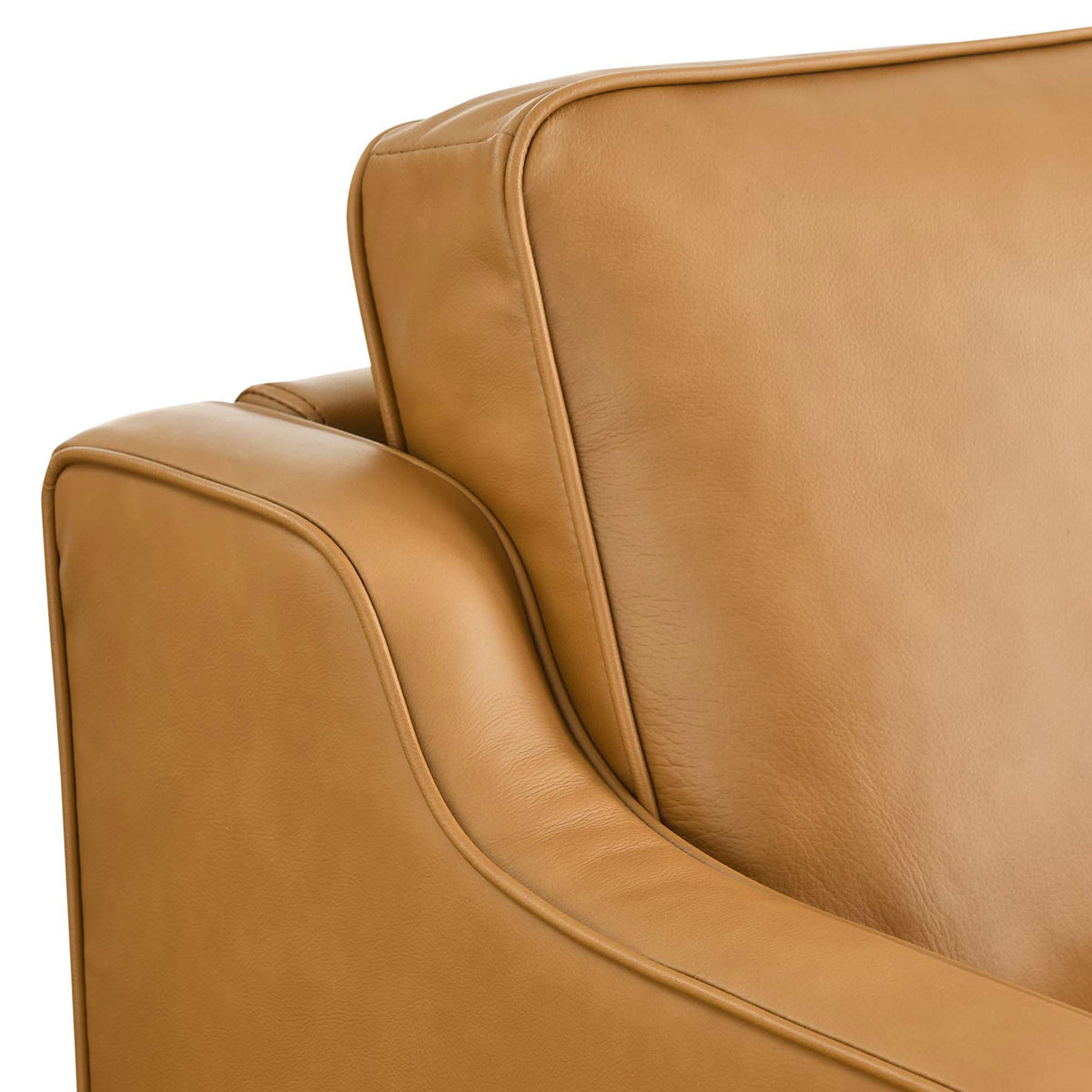 Tan leather arm and back cushions highlighting soft texture and refined stitching || EEI-5553-TAN || detail_studio